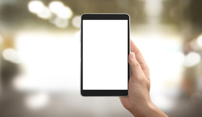 Hands holding tablet touch computer gadget