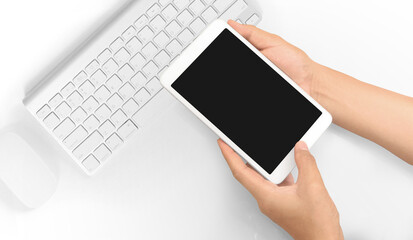 Hands holding tablet touch computer gadget