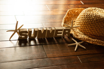 Summer related items on the wooden floor