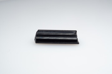 Natural black tourmaline on a white background. Sherl, sherlite