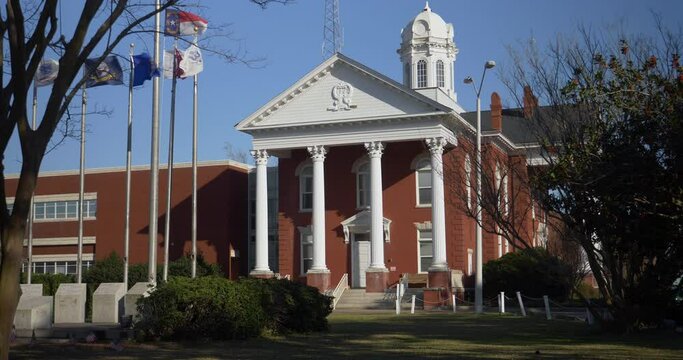 BEAUFORT, NC - Circa March, 2021 - A daytime exterior establishing shot of the Carteret County Courthouse on a late winter day.  	