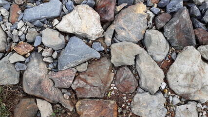 Big stone floor texture photo at the park, with colorful stones, copy space in the countryside, Thailand