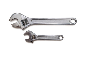 Large and small adjustable wrenches isolated on white background