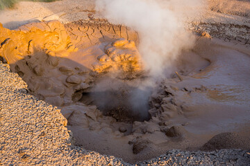 Steaming, sulfuric, active fumaroles near Pauzhetskaya Geothermal Power Plant, Kamchatka Peninsula, Russia