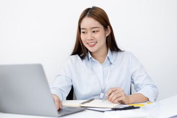 Financial or accounting professionals use a computer to analyze the company's revenue-expenses graph to prepare for presentation to the chief executive and partner.