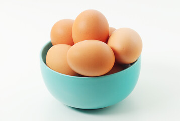 A bowl with chicken eggs