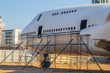 Old discarded airplane or jumbo jet is used as a restaurant