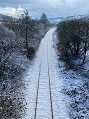 Snowy railway line leaving Maesteg south wales