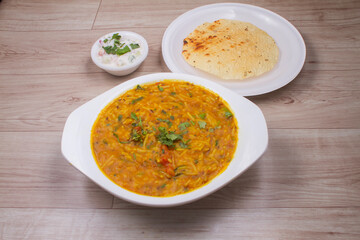 daal khichadi with curd and papad a healthy dinner, traditional Indian food