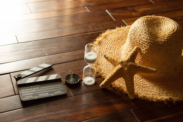Summer related items on the wooden floor
