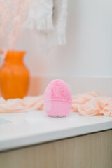 Silicone facial brush in bathroom