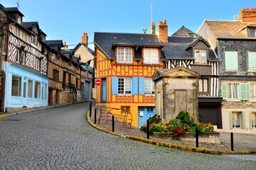 Historic half timbered buildings in the the beautiful town of Honfleur, France - obrazy, fototapety, plakaty