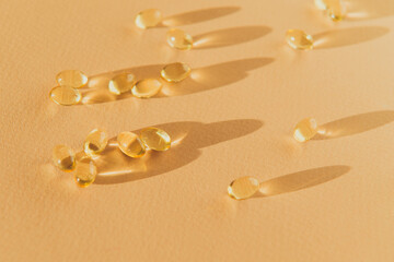 collagen capsules or omega 3 vitamins fish oil close up