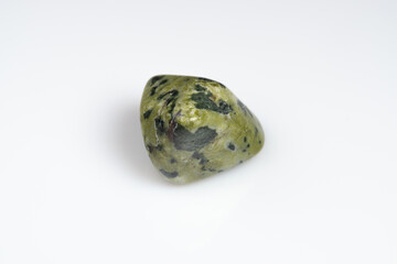 Natural stone green serpentine on a white background