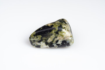 Natural stone green serpentine on a white background