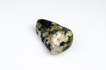 Natural stone green serpentine on a white background