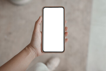 Women's hands holding cell telephone blank copy space screen. smart phone with technology concept