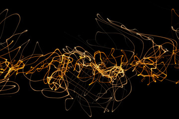 illustration of fire luminous curly lines representing sound wave isolated on black background with copy space. Banner for your design