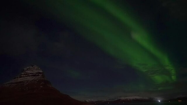 Dancing Aurora Borealis near Kirkjufell Mountain in West Iceland - real time video