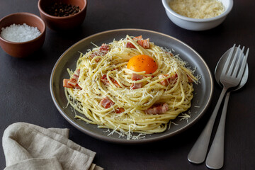 Pasta spaghetti carbonara with egg. Italian cuisine. Recipe. Food.