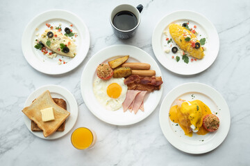 American and Thai breakfast set on the marble background