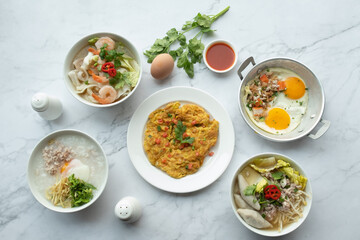 American and Thai breakfast set on the marble background