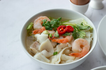 American and Thai breakfast set on the marble background