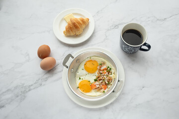 American and Thai breakfast set on the marble background