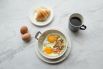 American and Thai breakfast set on the marble background