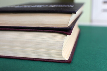 the edges of the books on the table close up