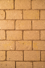 wall built of stone blocks of tuff