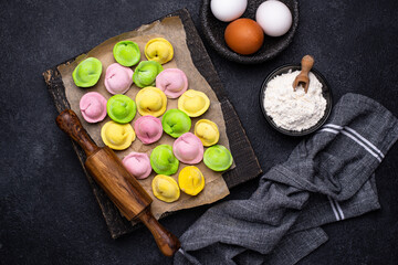 Multi colored dumplings stuffed with meat