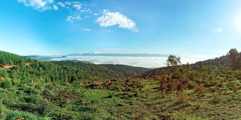 beautiful clouds on the background of the snowy Mount Hermon in winter