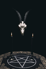 Witchcraft composition with goat skull, candles and pentagram symbol. Halloween and occult concept, black magic ritual.
- 419453426
