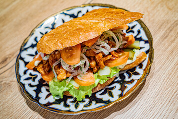 tasty sandwich with meat and vegetables
