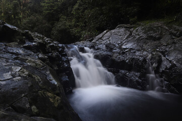 Naklejka premium waterfall in the forest
