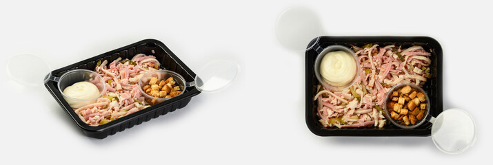 salad of pickles, sausage, cheese and breadcrumbs on a white background with a shadow