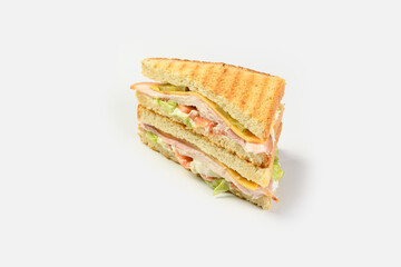 sandwich toast with ham, cheese, sauce, cucumber greens on a white background