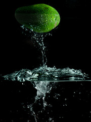 avocado in water with splashes