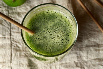 Green juice with an ecological paper straw