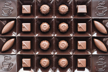 assorted candies on a white background, candies in a box, a set of chocolates, chocolates 