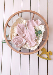 Mockup for announcement pregnancy . Space for text on textile background