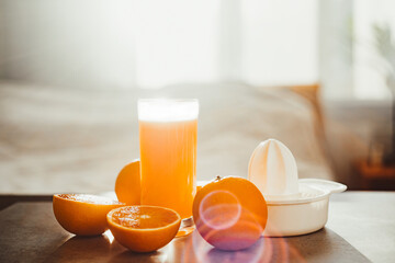 Fresh homemade orange juice in bedroom for breakfast