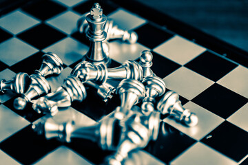Chess board game to represent the business strategy with competition in the world market. and find...