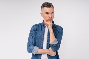 Thoughtful european handsome man isolated over white background