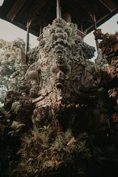 Low angle exterior of entrance of historical hindu Ubud Palace or Puri Saren Agung with traditional statues located in Bali in Indonesia