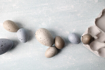 organic easter eggs with a paper box on a light background
