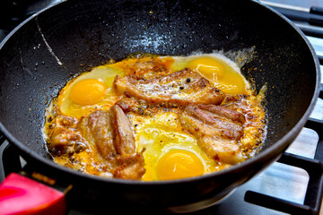 Fried pork steak with fried chicken egg.