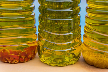 essence of golden olive oils made with mediterranean herbs and chili
