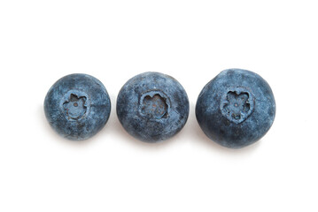 Three blueberry isolated on white